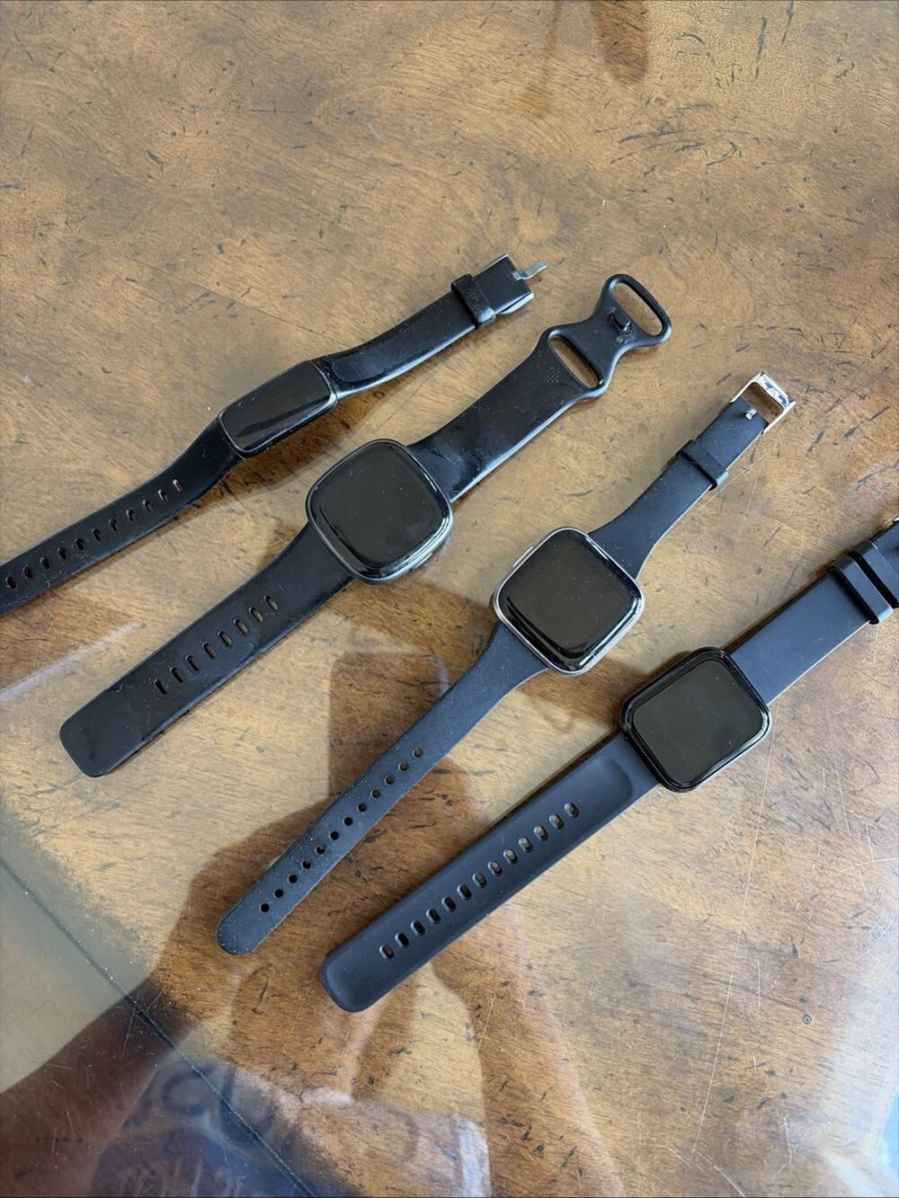 Lot of 4 Untested Fitbit/ Health Tracker Watches- No Charger As Is Untested